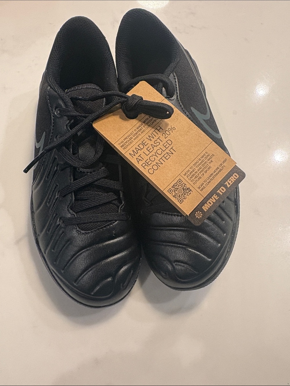 Nike Kids Black Sneakers with Subtle Gray Swoosh